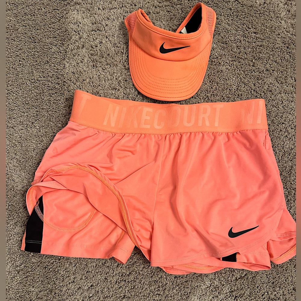 Nike Court shorts and matching Nike visor, salmon pink